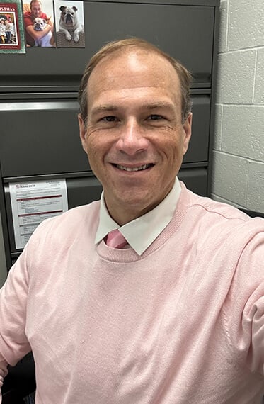 A selfie of Kevin smiling at the camera